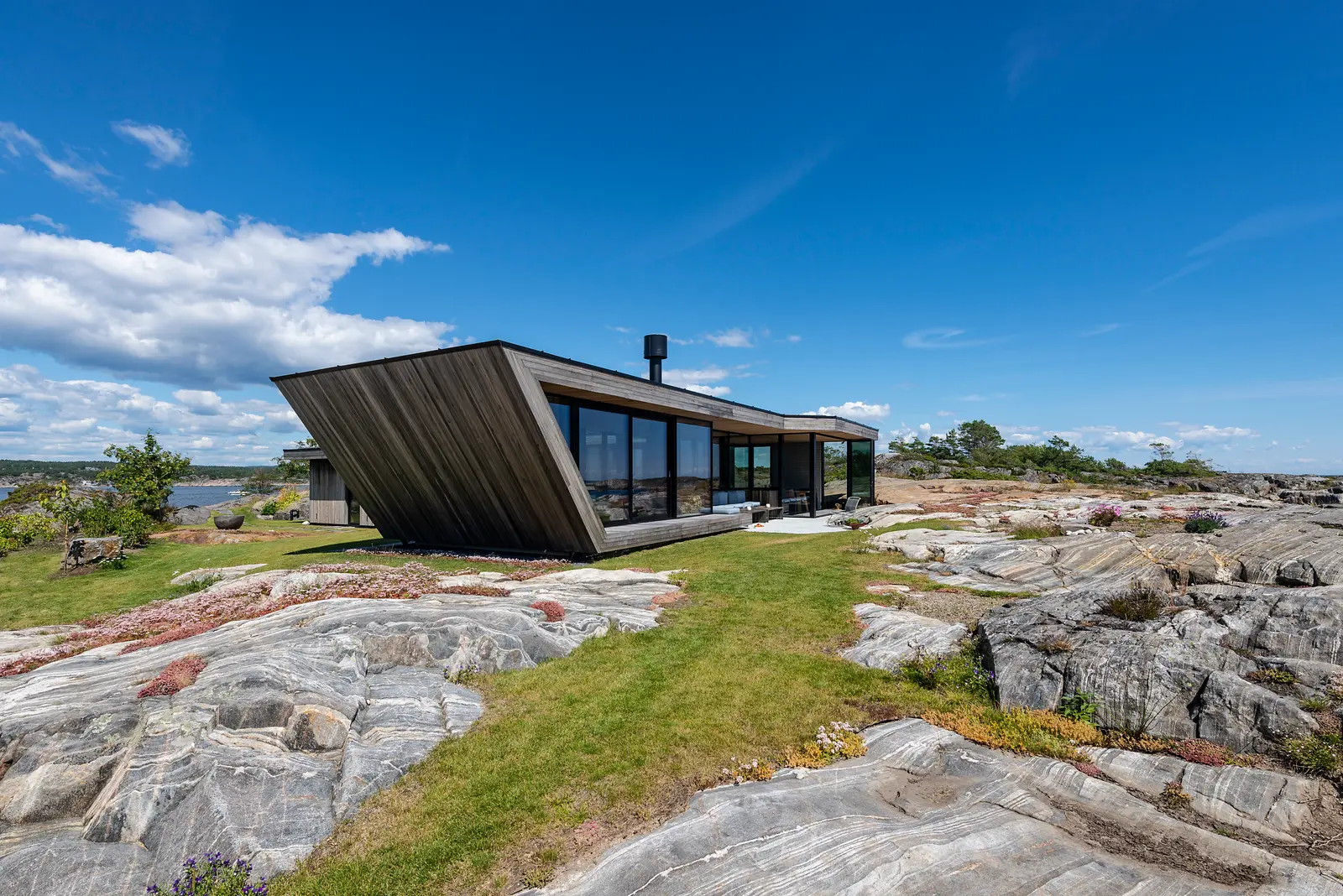 Placebo, Risør, Norway — Reynaers CF 68 folding doors, CW 50 facade and Slimline 38 windows