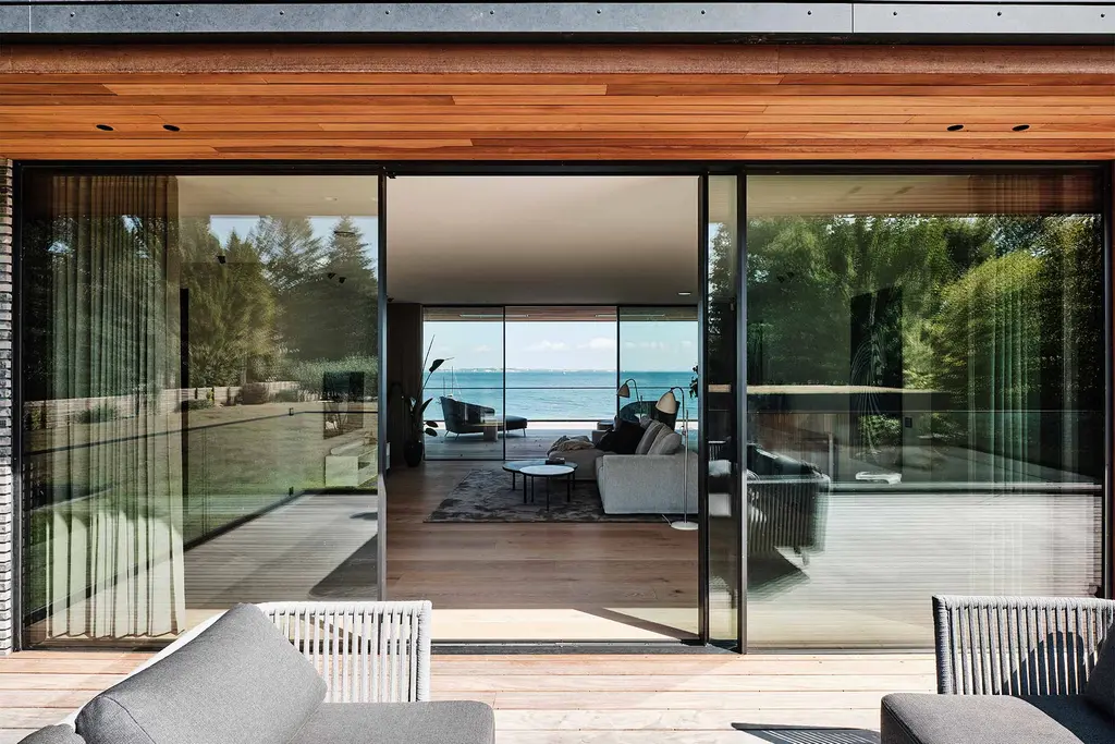 Vedbæk, Denmark · a floor-to-ceiling sliding door, run aside